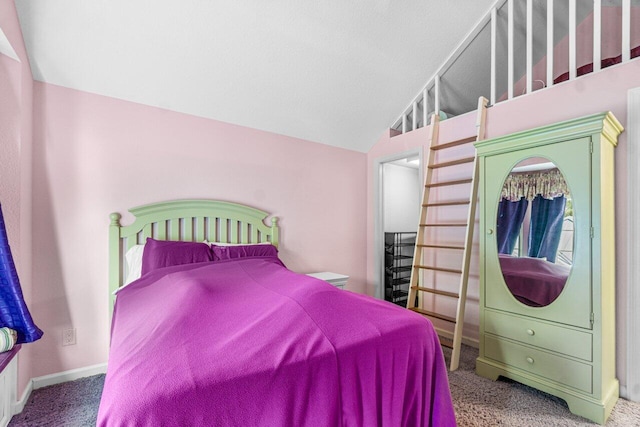 carpeted bedroom featuring vaulted ceiling