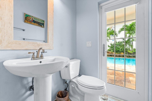 bathroom with sink and toilet