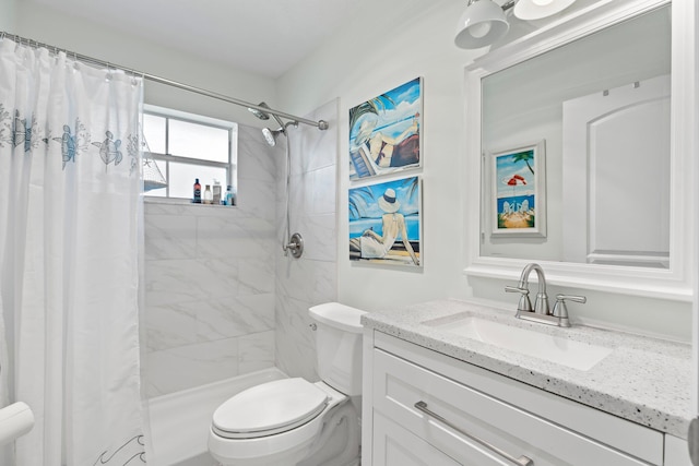 bathroom with vanity, toilet, and walk in shower