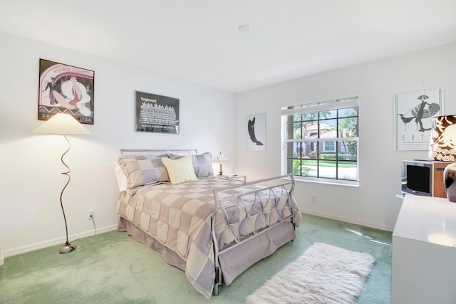 bedroom featuring carpet flooring