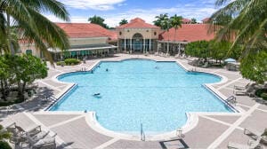 view of swimming pool with a patio area