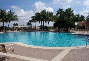 view of swimming pool featuring a patio area