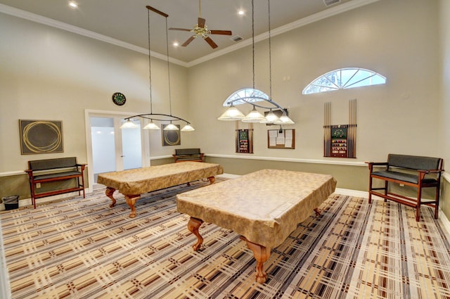 playroom with ceiling fan, french doors, a high ceiling, crown molding, and pool table