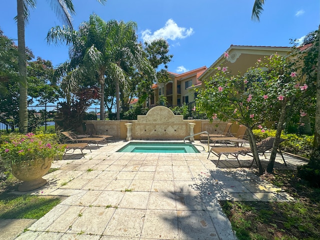 view of swimming pool featuring a patio