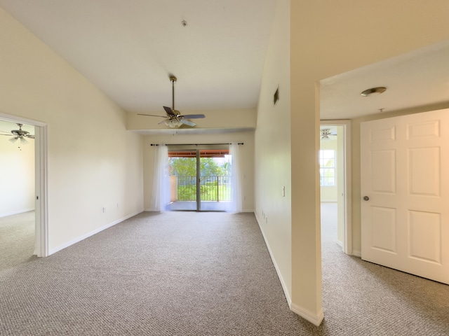 unfurnished room featuring carpet and ceiling fan