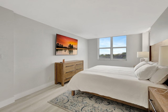 1801 S Flagler Dr Unit 701, West Palm Beach, FL 33401 - bedroom featuring light wood finished floors and baseboards