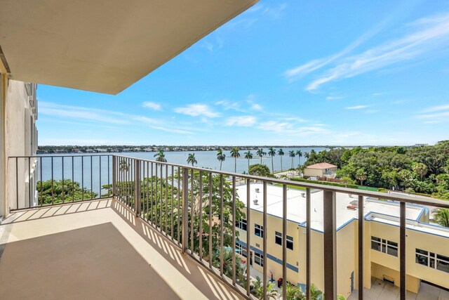 balcony featuring a water view