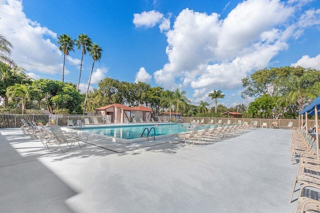 view of swimming pool with a patio area