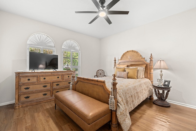 bedroom featuring wood-type flooring and ceiling fan