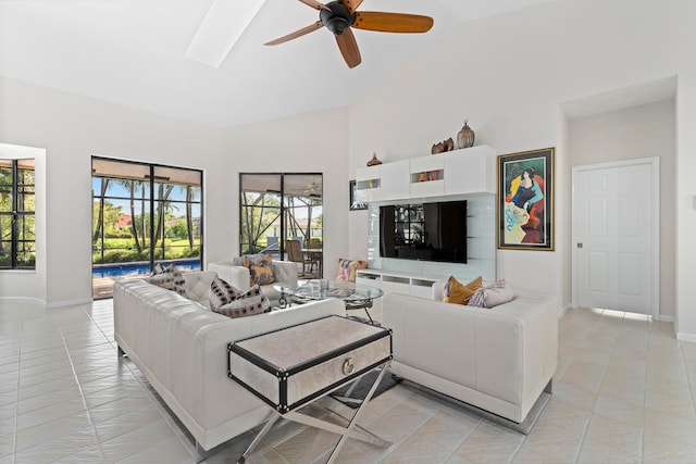 living room featuring light tile patterned flooring and ceiling fan