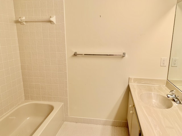 full bath with vanity, baseboards, shower / washtub combination, and tile patterned floors