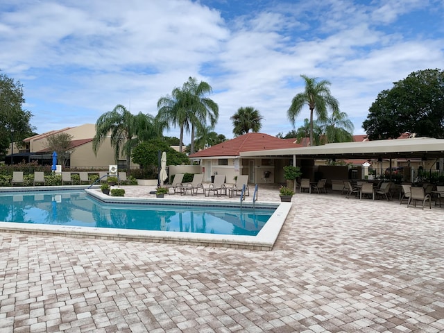 pool with a patio area