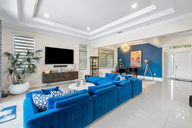 living room featuring a raised ceiling, light tile patterned flooring, and ornamental molding