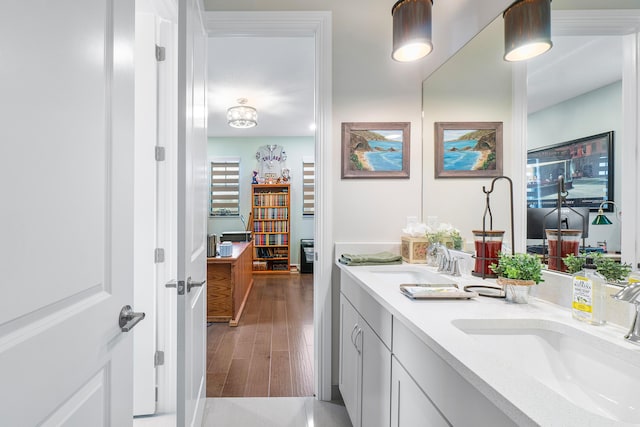 bathroom featuring hardwood / wood-style floors and vanity