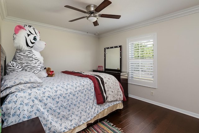 bedroom with ceiling fan, ornamental molding, and dark wood-type flooring