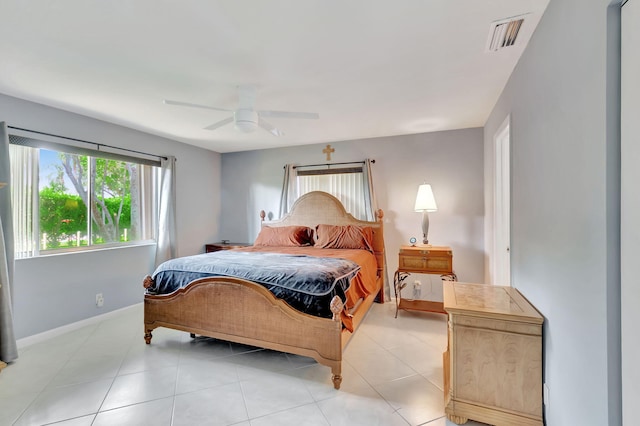 bedroom featuring ceiling fan and light tile patterned floors