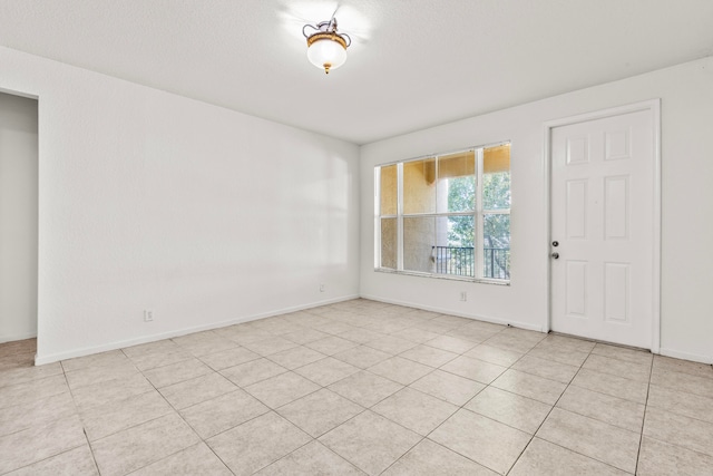 view of tiled spare room