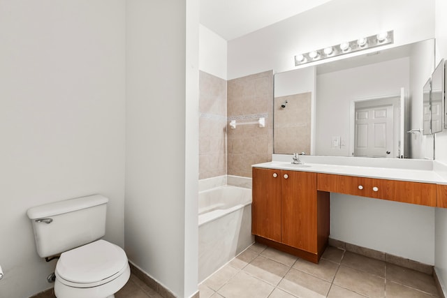 full bathroom featuring tile patterned flooring, vanity, toilet, and tiled shower / bath combo