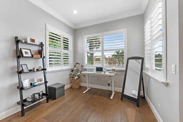 home office with baseboards, wood finished floors, and ornamental molding