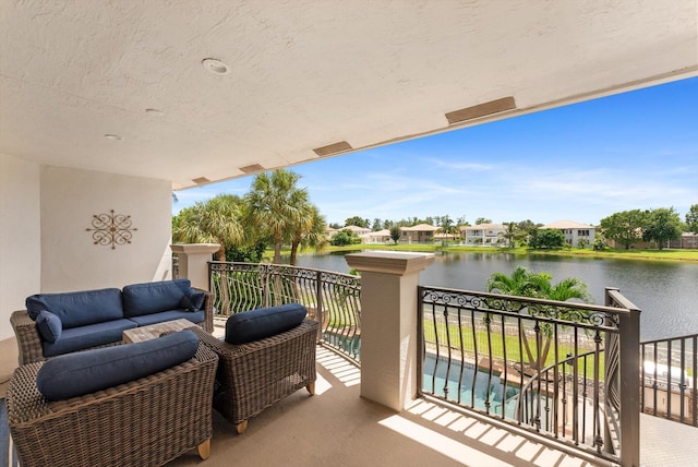 balcony featuring a water view