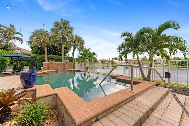 view of swimming pool with a patio area, a fenced backyard, a fenced in pool, and a water view