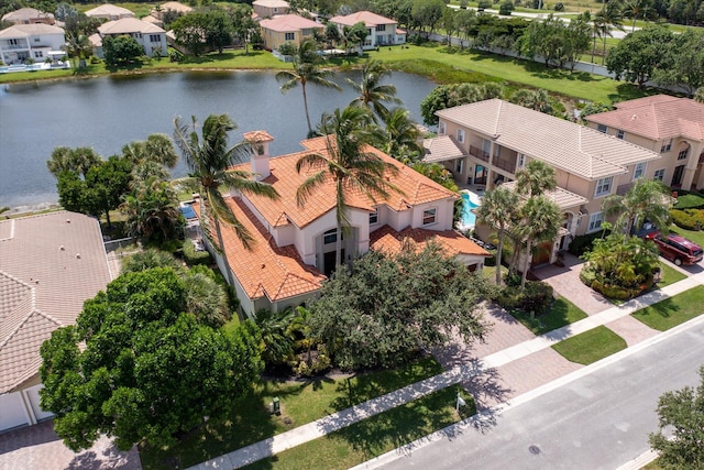 aerial view featuring a residential view and a water view