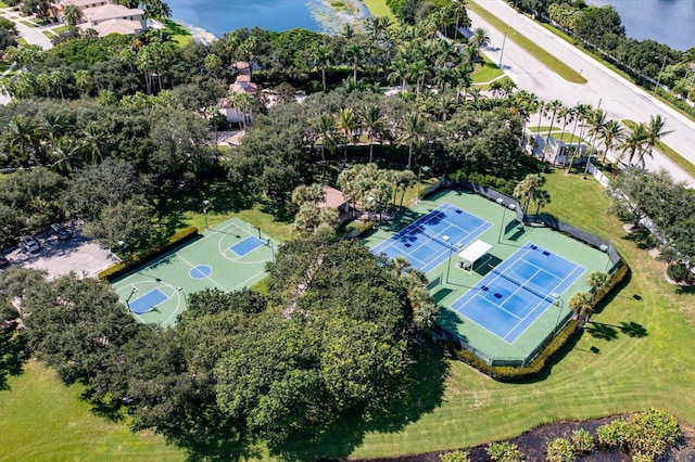 birds eye view of property with a water view