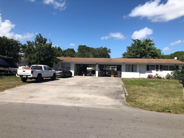 single story home with a front yard