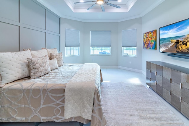 bedroom with a raised ceiling, ornamental molding, a ceiling fan, recessed lighting, and baseboards