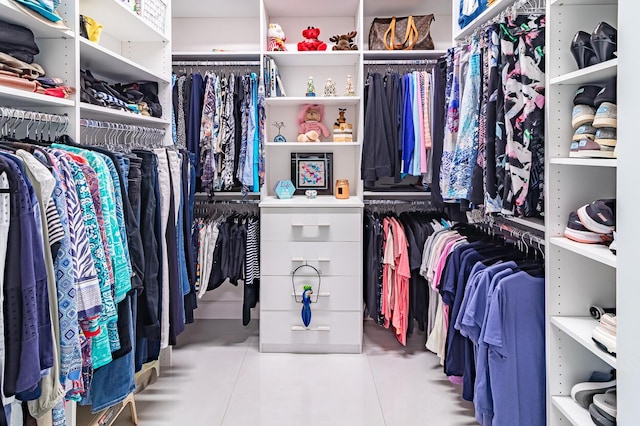 spacious closet with tile patterned flooring