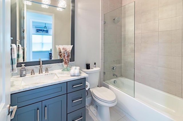 bathroom featuring vanity, toilet, and shower / bathtub combination