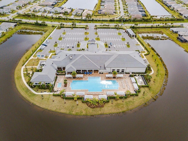 aerial view featuring a residential view and a water view