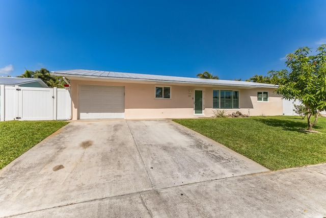 ranch-style house with a front lawn and a garage