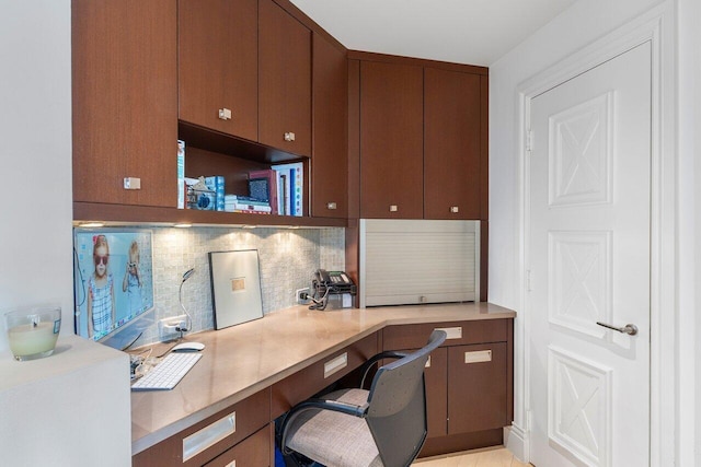 office area with built in desk