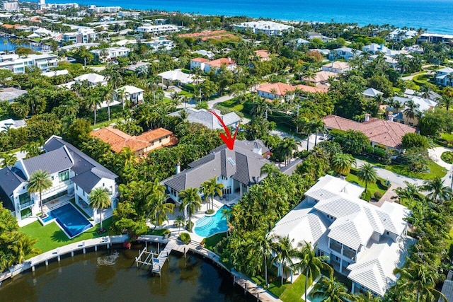 aerial view with a water view and a residential view