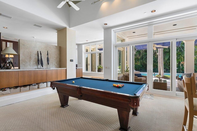 game room featuring carpet, pool table, ceiling fan, and a high ceiling