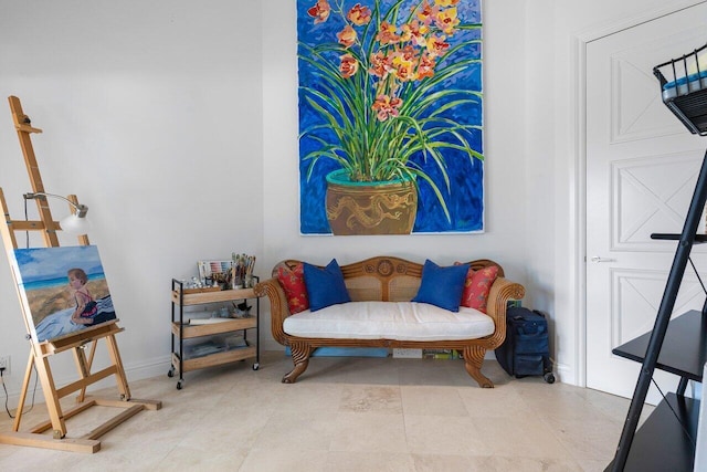 sitting room with light tile patterned flooring