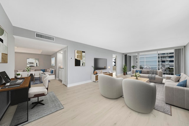 living room with light wood-type flooring