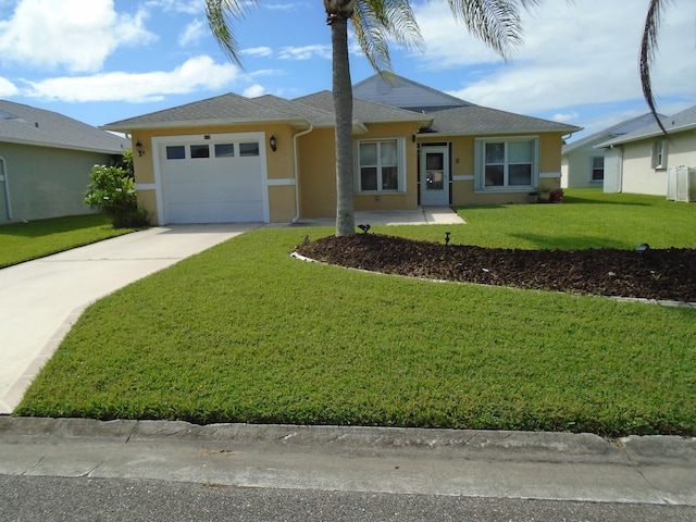 ranch-style home with a garage and a front lawn