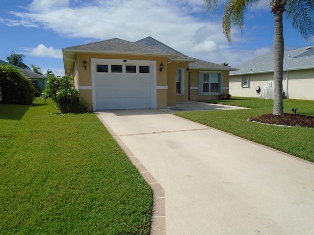 view of front facade with a garage and a front yard