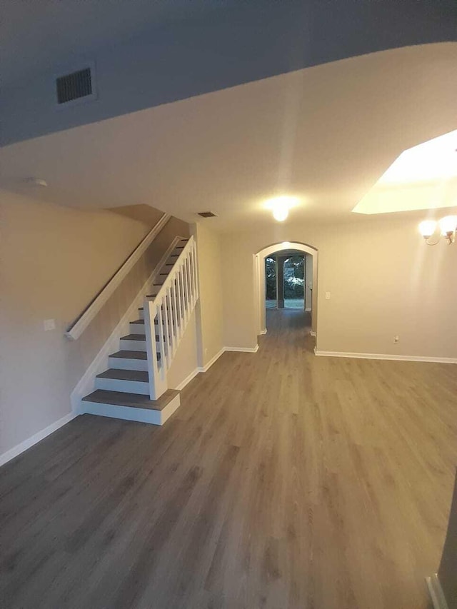 bonus room featuring hardwood / wood-style floors