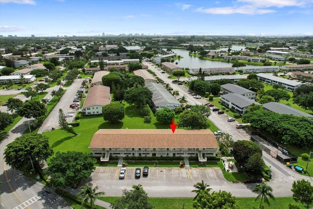 drone / aerial view with a water view