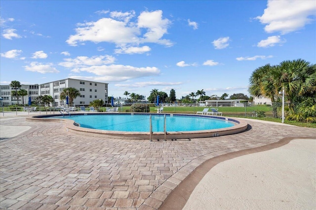 view of swimming pool featuring a patio