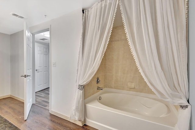 bathroom featuring wood-type flooring