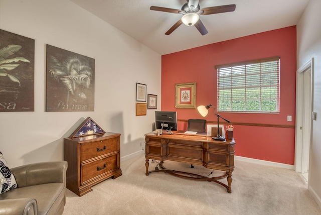 office with light colored carpet, ceiling fan, and baseboards