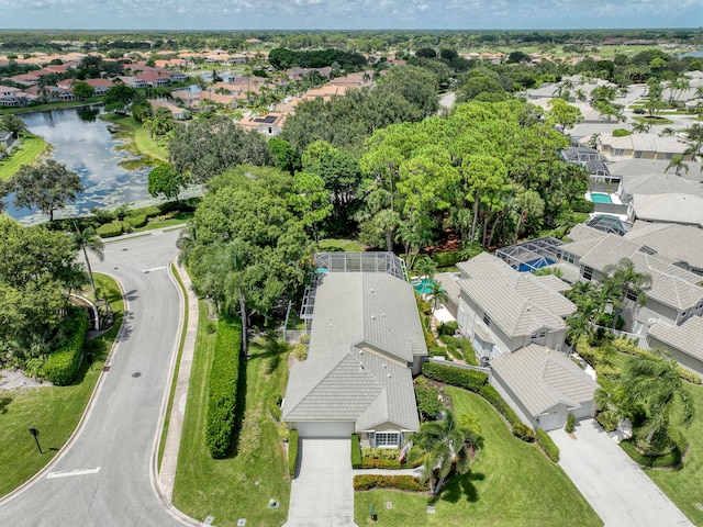 aerial view with a water view and a residential view