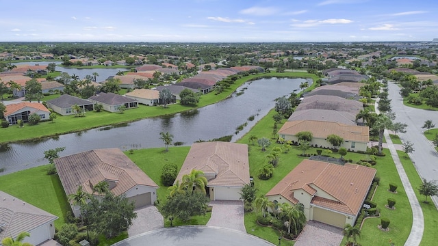 drone / aerial view with a water view