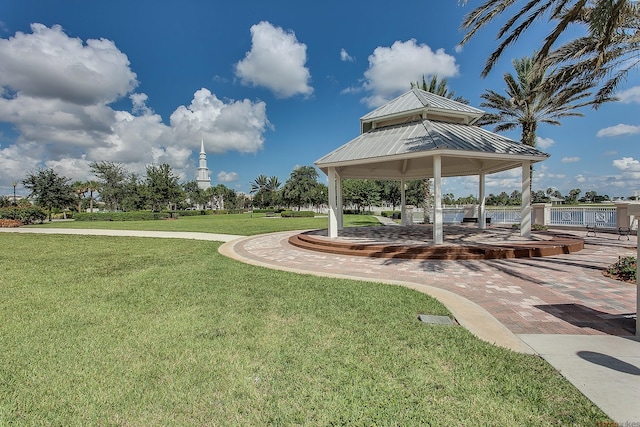 view of community featuring a yard and a gazebo