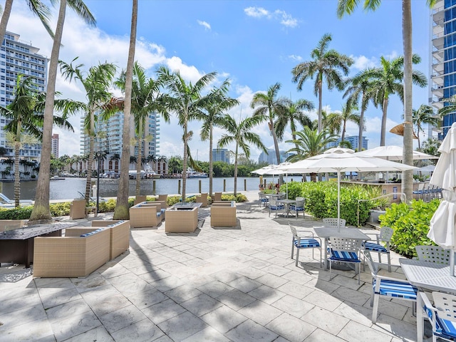 view of patio with a water view