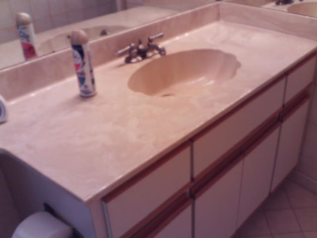 bathroom with vanity and tile patterned flooring